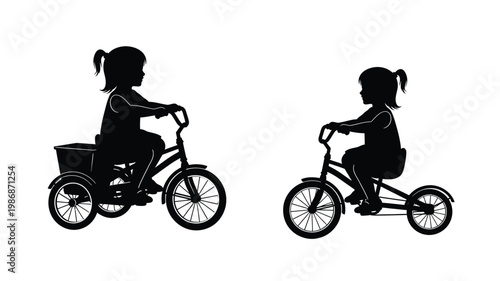 Two young children riding tricycles a charming black silhouette