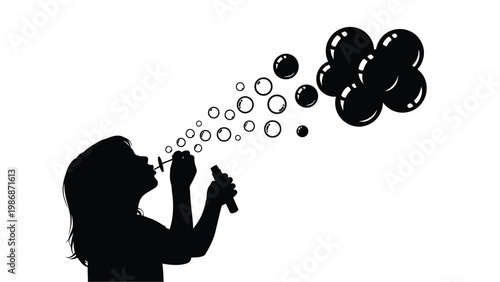 Child blowing bubbles a playful moment captured in silhouette