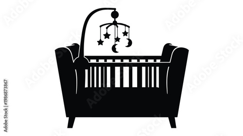 Baby crib with mobile above a striking black silhouette