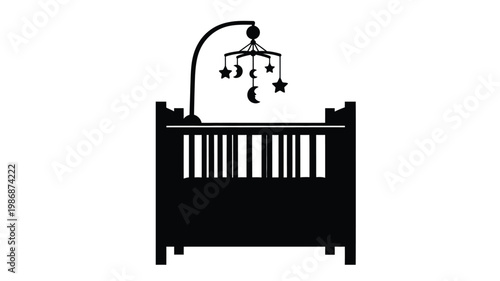 Black baby crib with mobile above a stark silhouette