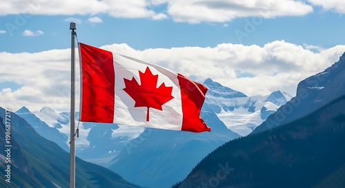 Canadian flag waving in front of a mountain range landscape with cloudy sky