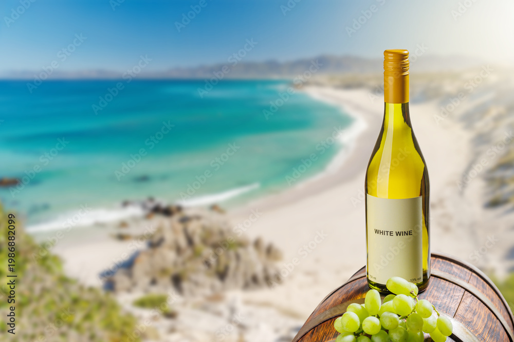 Obraz premium White wine bottle with grapes by sea beach