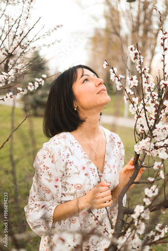 Картината върху платно Portrait of charming pretty woman dressed flowery dress having fun laughing smil