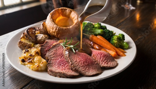 Traditional British Sunday Roast Beef with Gravy and Vegetables