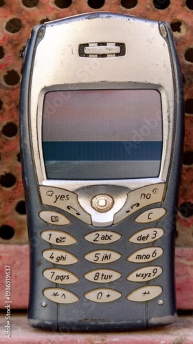 mobile telephone stop motion in urban settings with eyes on screen in vertical