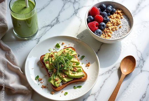 A vibrant breakfast scene featuring a green smoothie, avocado toast, and a bowl of granola with berries.