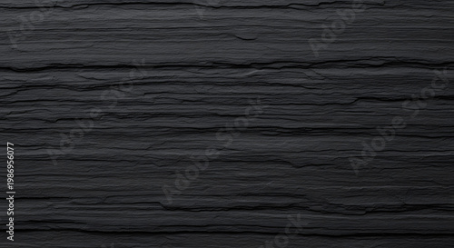 A dark and weathered old wood texture featuring a rough brown plank pattern with natural grain, perfect for a rustic timber wall or grunge hardwood backdrop material