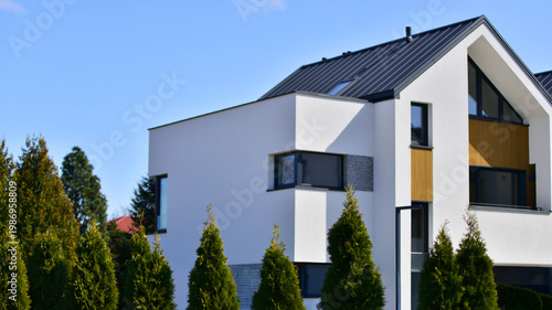 Brand new row single family houses. Modern design of urban living residences with side private courtyards, sophisticated finishes, new development.