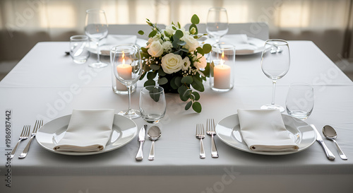 Elegantly set dining table with floral centerpiece and candles for a special occasion