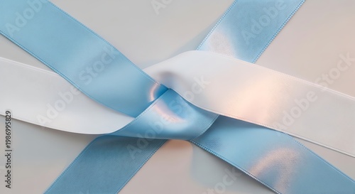 Close up of a light blue and white silk ribbon knot soft focus