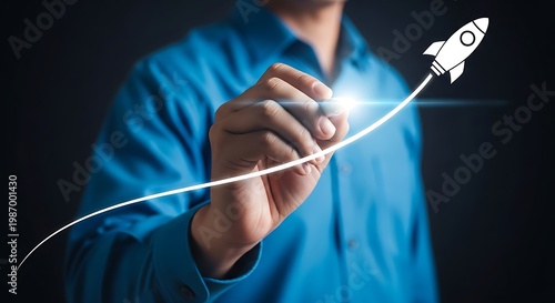 Businessman drawing upward trend with rocket symbolizing growth and success in modern office, conceptual image of progress and innovation.