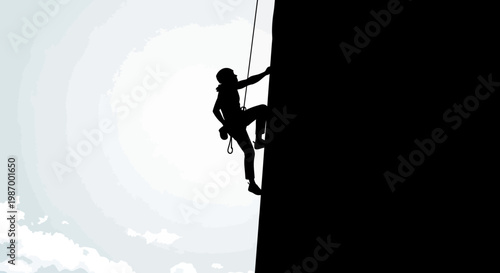 Silhouette Of A Climber Ascending A Steep Rock Face Against A Cloudy Sky