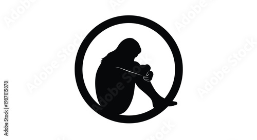Black silhouette of a person sitting in a circle with their head down