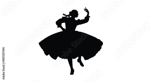 Silhouette of a woman in a beautiful ballet pose with her skirt flowing around her body