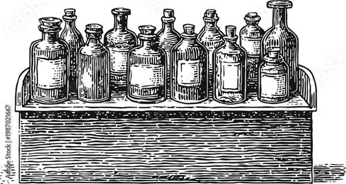 vintage glass apothecary bottles set on wooden shelf with detailed engraving
