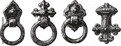 Antique medieval iron door knockers set with ornate vintage decorative designs