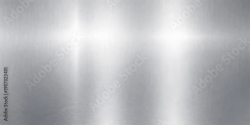 A polished silver stainless steel plate with a brushed metal texture and industrial gray aluminum surface makes a sleek metallic wallpaper pattern