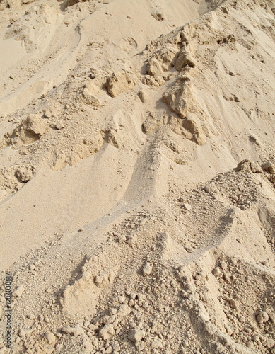 Construction sand pile texture, bulk sand material close up