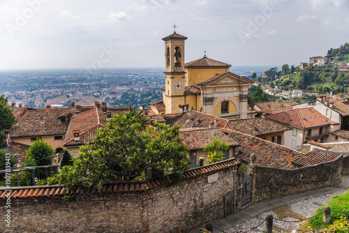 Fotografie Historic Santa Grata Inter Vites church and rooftops of Bergamo Citta Alta with