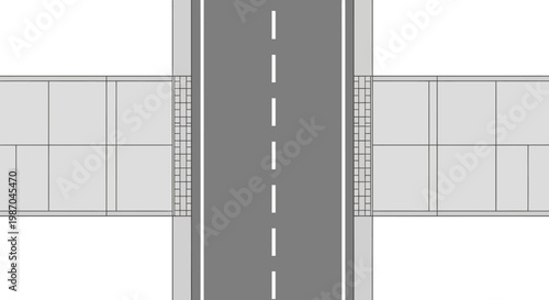 A gray road with white markings on a bridge.