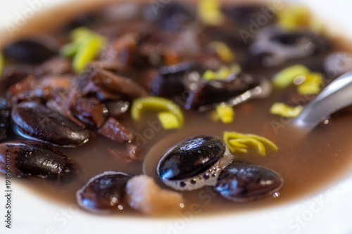 Wallpaper Mural Black bean soup with vegetable and sliced leek in white plate. Torontodigital.ca
