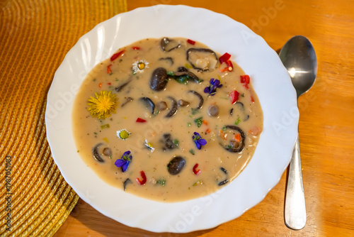 Wallpaper Mural Mushroom soup in asian style with coconut milk, flowers and chilli in white plate Torontodigital.ca