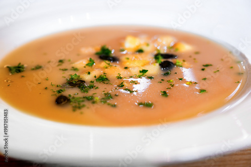 Wallpaper Mural Creamy cauliflower soup with sunflower seed, apple cube,herb and oil in white plate. Torontodigital.ca