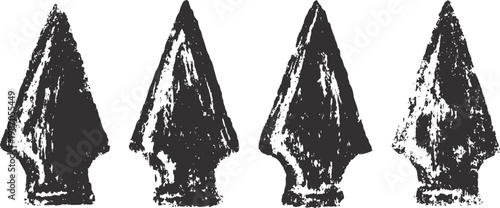 Ancient arrowheads collection four stone spear tips with rough textures prehistoric tools and artifacts from early human history