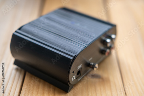 Obraz na plátně Black phono preamplifier with RCA connectors, ground terminal, power input jack,
