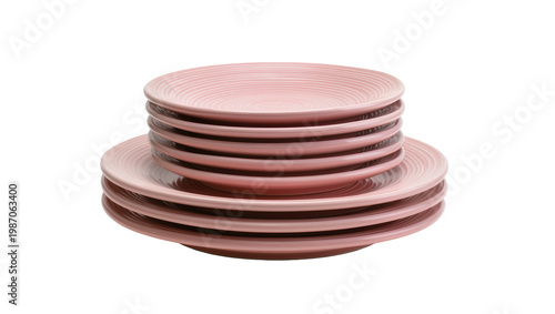 Stack of pink ceramic plates with concentric circle texture, isolated on transparent background