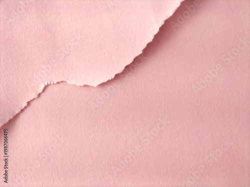 Fotografie Torn pink paper with irregular edges and a fibrous texture, emphasizing the coarseness and natural appearance