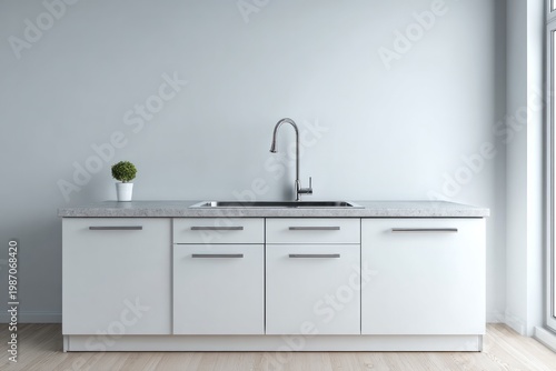 A modern white kitchen counter with a sink and faucet is shown.