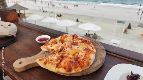 Dining with ocean view and beachfront lunch show tasty meal with tropical scenery. Beautiful seaside landscape and fresh food create perfect vacation atmosphere at resort. Ocean view moment is nice.