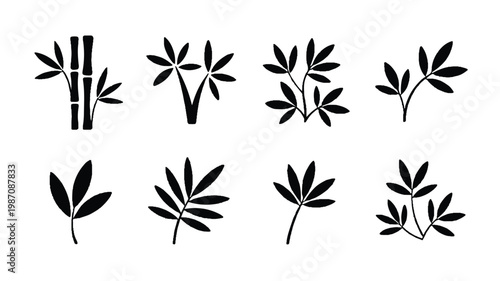 black silhouettes of various plants and bamboo stems on white background