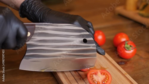 Healthy cooking process with fresh tomato slicing tomato texture detail tomato preparation in kitchen millennial hands cutting vegetables nutrition concept clean diet meal closeup food scene