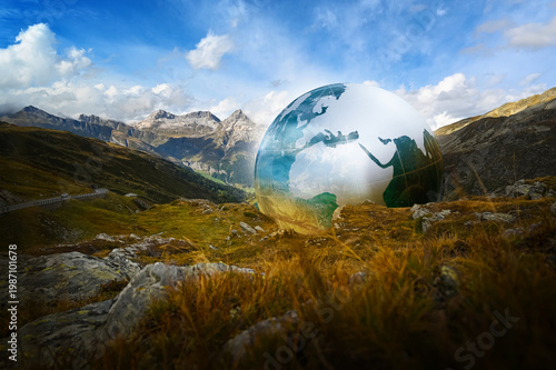 Environment, nature, a crystal globe ball in the mountains of Europe Splügen Pass Italy and Switzerland, Asia and Africa – sustainable environment and ecology, Earth, the world in 2026.