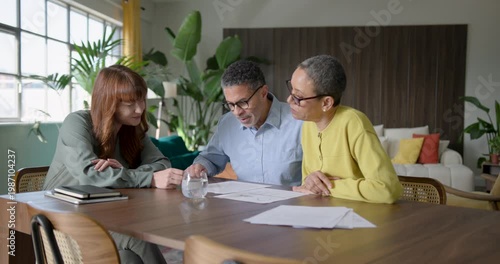 Senior Couple Meeting with financial advisor to discuss finances