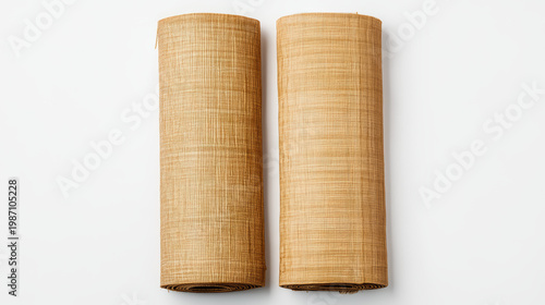 Two bamboo mat roll placed side by side on white background, natural texture, minimal style