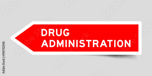 Bild auf Leinwand Red color arrow shape sticker label with word drug administration on gray backgr