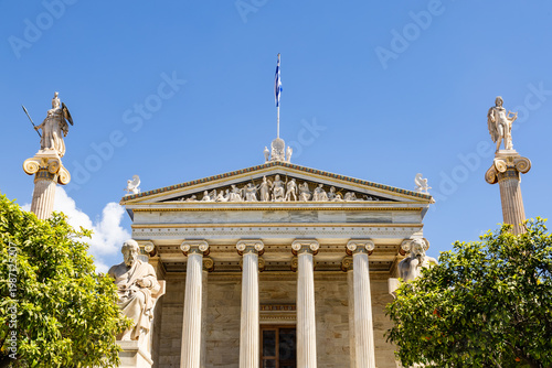 A section of the neoclassical building of the modern University of Athens, featuring statues of Plato, Socrates, Athena, and Apollo. Athens, Panepistimio, Greece