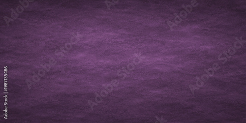Purple textured background with a mottled effect for design and artistic projects