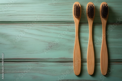 Eco-Friendly Bamboo Toothbrushes on Rustic Wooden Surface.