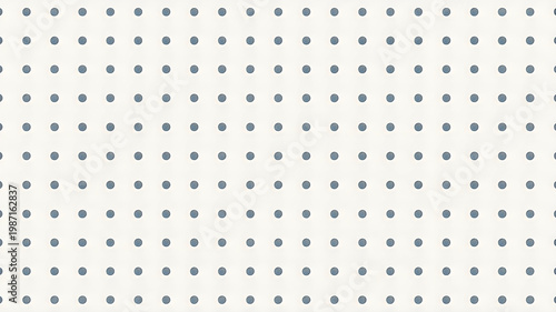 A white surface with many small gray dots