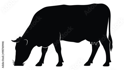 A silhouetted cow is shown grazing on grass in a simple graphic style