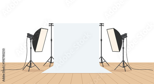 Professional photography studio backdrop setup with dual softbox lighting equipment positioned on sturdy metal tripods in a bright minimalist workspace.
