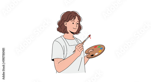 A creative female artist with wavy brown hair holds a wooden palette and paintbrush while wearing a clean white apron in a bright minimalist studio.