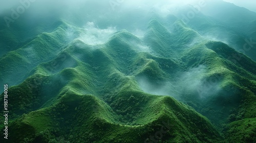 Misty Green Mountain Landscape With Fog And Dramatic Lighting