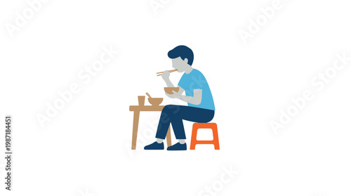 Man sitting at small table eating.