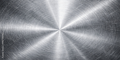 Scratched brushed metal radial texture background, silver stainless steel surface, circular light reflection, industrial metallic pattern, abstract modern design backdrop