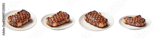 Variety of delicious grilled steaks arranged on white plates against a black backdrop